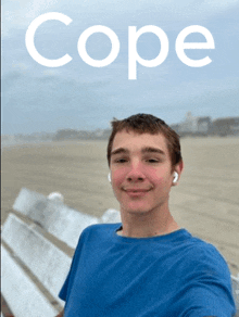 a young man taking a selfie with the word cope on the bottom