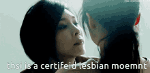 a picture of two women kissing with the caption " this is a certified lesbian moment "