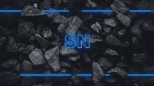 the word sn is glowing in blue on a dark background