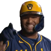 a man wearing a yellow helmet with the letter o on it