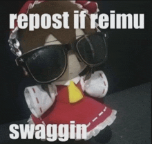 a stuffed animal wearing ray-ban sunglasses with the caption repost if reimu swaggin