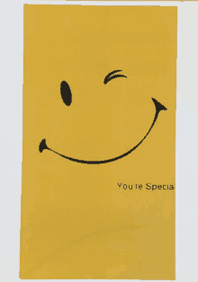 a yellow poster with a smiley face and the words " you 're special " below it