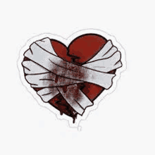 a bloody broken heart wrapped in bandages and tape .