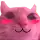 a close up of a pink cat with pink cheeks .