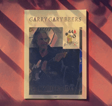 a book titled garry gary beers with a man playing a guitar