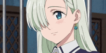 a girl with white hair and blue eyes is wearing a pair of earrings