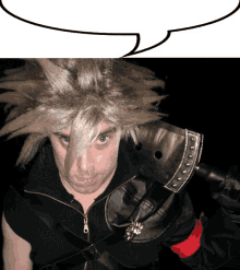 a man wearing a wig and a black jacket has a speech bubble above his head