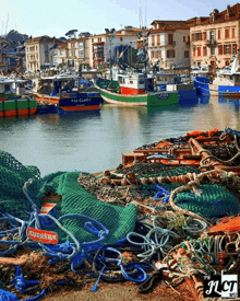 a bunch of fishing nets and ropes with a sign that says rubber