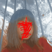 a girl with a red drawing on her face