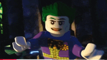 a lego joker in a purple suit and bow tie