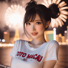 a woman wearing a toto macau t-shirt stands in front of a fireworks display