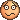 a pixel art smiley face with a sad look on it 's face .