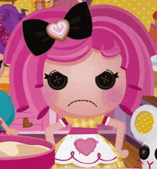 a cartoon doll with pink hair and a bow has a sad look on her face