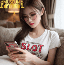 a woman wearing glasses and a shirt that says slot on it