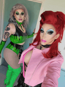 two drag queens are posing for a picture with one wearing a green top