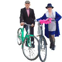 a man and a woman are riding bicycles with pink flowers in the baskets