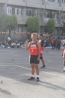 a man wearing a red jersey that says civil engineering on it