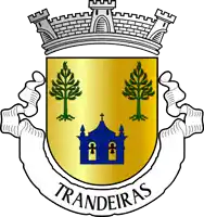 a coat of arms for traneiras with a castle and two trees on it