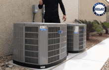 a man giving a thumbs up in front of two air conditioners with a logo for r & r heating & air conditioning