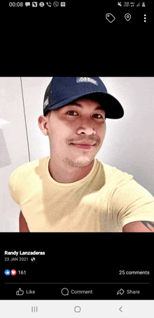 a man wearing a yellow shirt and a blue hat has 25 comments on his facebook page