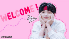 a pink background with a boy and the word welcome