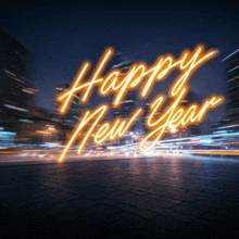 a neon sign that says happy new year in front of a city skyline