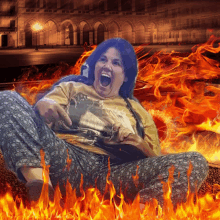 a woman is screaming in front of a fire