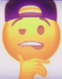 a yellow smiley face with a purple hat on it