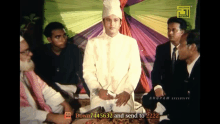 a group of men sitting in front of a screen that says anupama exclusive