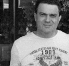 a man wearing a t-shirt that says united states air force academy 1989