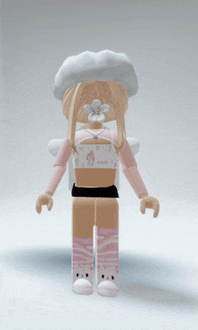 a girl with a flower in her hair is wearing a white hat and a crop top with my melody on it