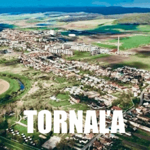 an aerial view of a small town with the word tornala written on the bottom