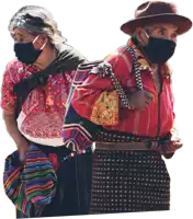 a man and a woman wearing face masks are standing together