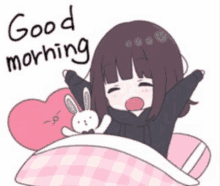 a girl is laying in bed with a stuffed rabbit and a heart pillow and says `` good morning '' .