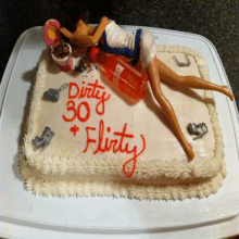 a dirty 30 flirty cake with a barbie figure on top