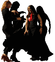 a woman with a red scarf around her neck is dancing with another woman in a black dress