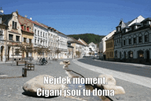 a picture of a city with the words nejdek moment cigani jsou tu doma on the bottom