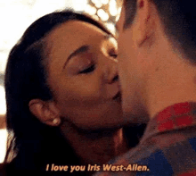 a man and woman are kissing and the woman is saying `` i love you iris west-allen '' .