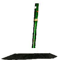 a green mop is sitting on top of a black rug