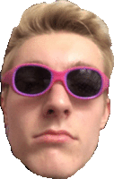 a man wearing a pair of pink sunglasses is making a funny face