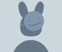 a silhouette of a person wearing a mask with bunny ears and a smile on their face .