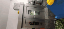 a picture of a stainless steel oven was taken on october 28th 2020