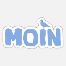 a blue and white moin sticker with a bird on top