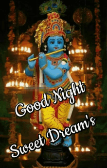 a picture of a statue of krishna playing a flute with the words good night sweet dream 's