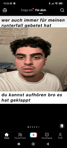 a phone screen shows a picture of a man with a caption that says du kannst aufhoren bro es hat geklappt