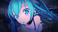 a girl with blue hair and blue eyes is wearing headphones and looking up at the camera .