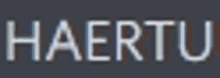 the word haertu is written in a blurred font on a dark background .