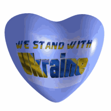 a blue heart that says " we stand with ukraine "