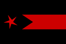 a red and black flag with a star in the middle