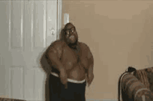 a very fat man is dancing in a living room .